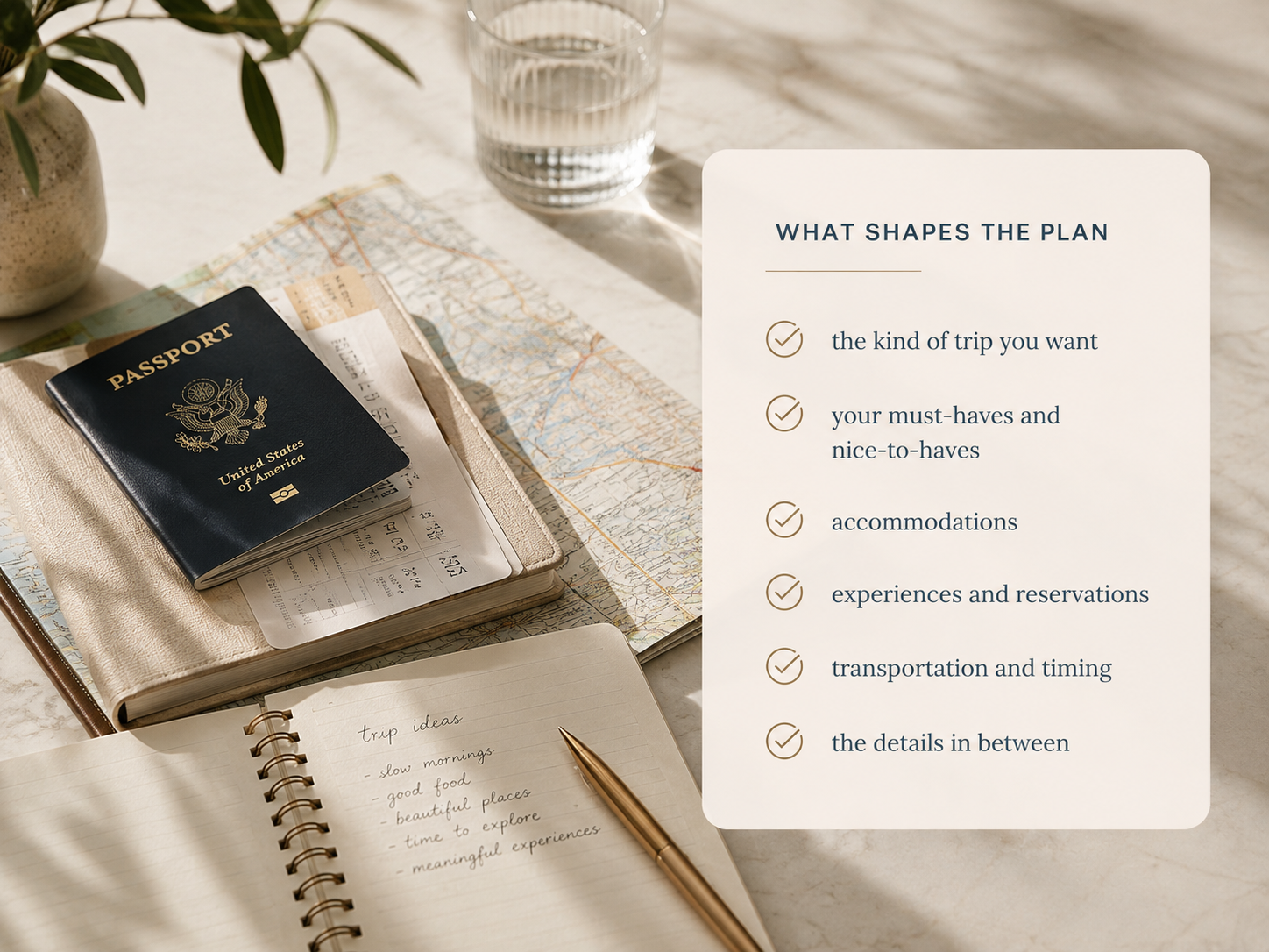 Notebook, pen and coffee on a warm wooden desk — travel planning